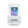 A white coffee bag with a black ZAVO logo stamped on. It has two product cards, one is a blue and purple multicoloured card with a Toucan on it, the other is a blue tasting notes card which says Strength Medium.